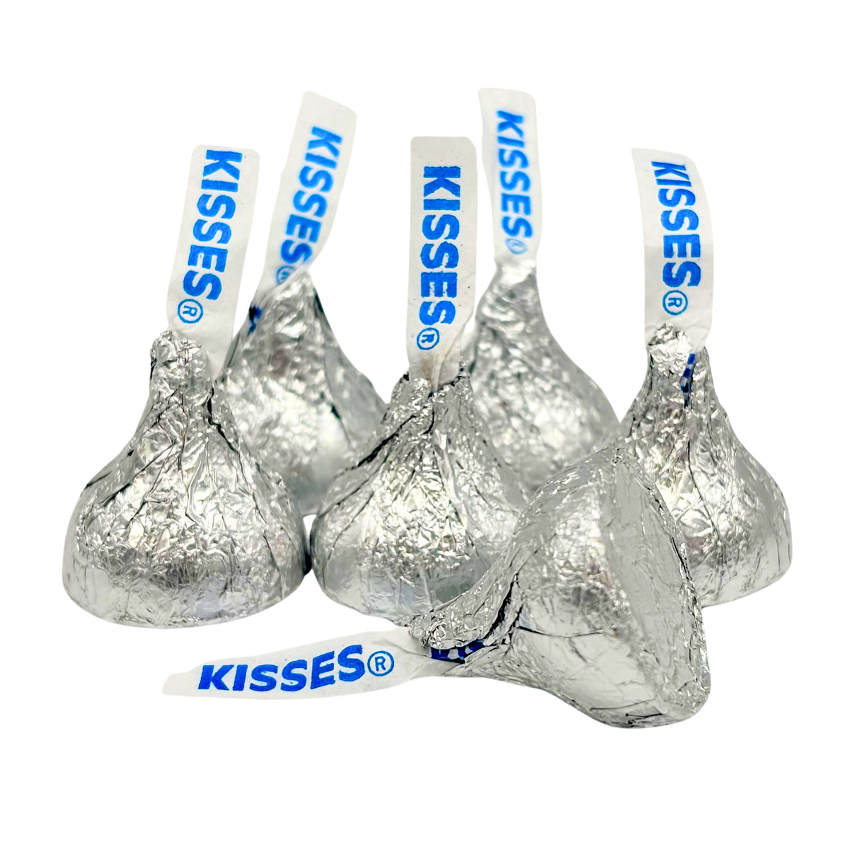 A group of Hershey's Kisses wrapped in silver foil with blue and white branded labels.