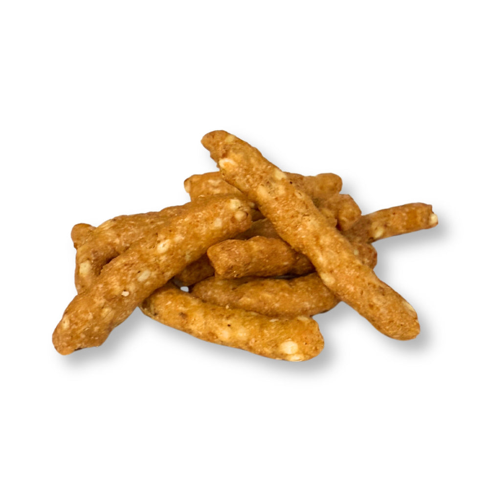 Pile of cheese sticks on a white background